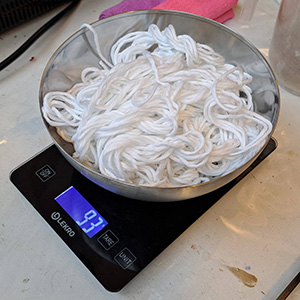 weighing fibers when dry