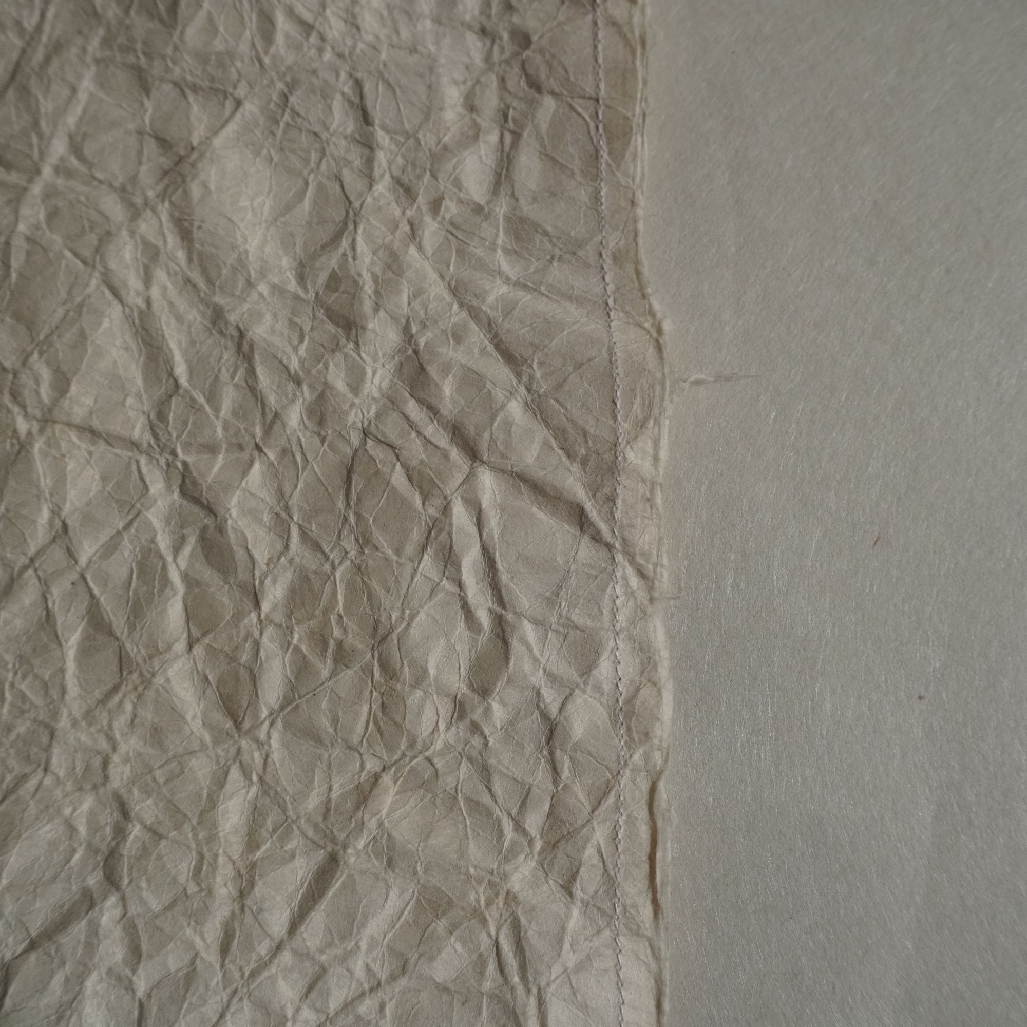wrinkled by life and plain paper