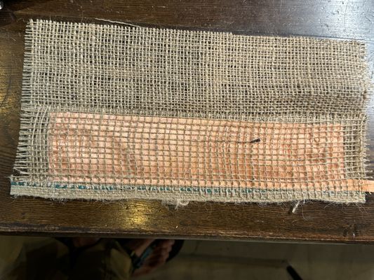 sewed Jute against cupper fabric