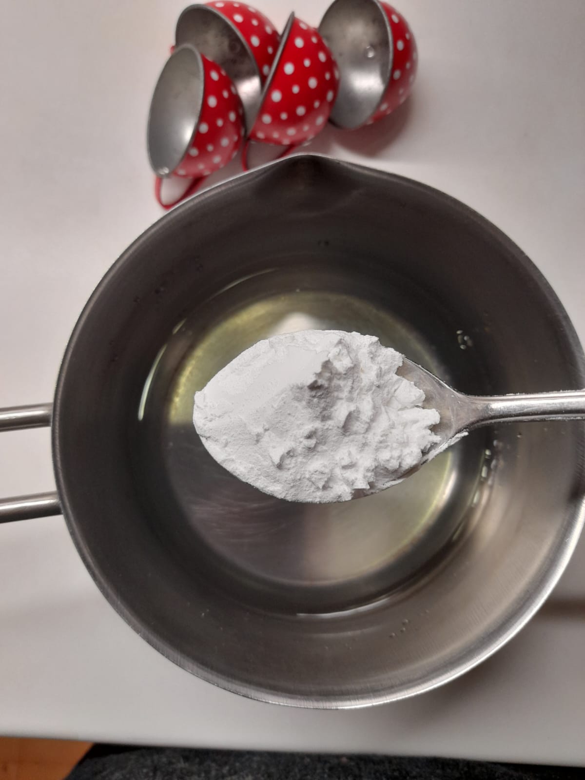 Applying starch mixture to shape and bind petals