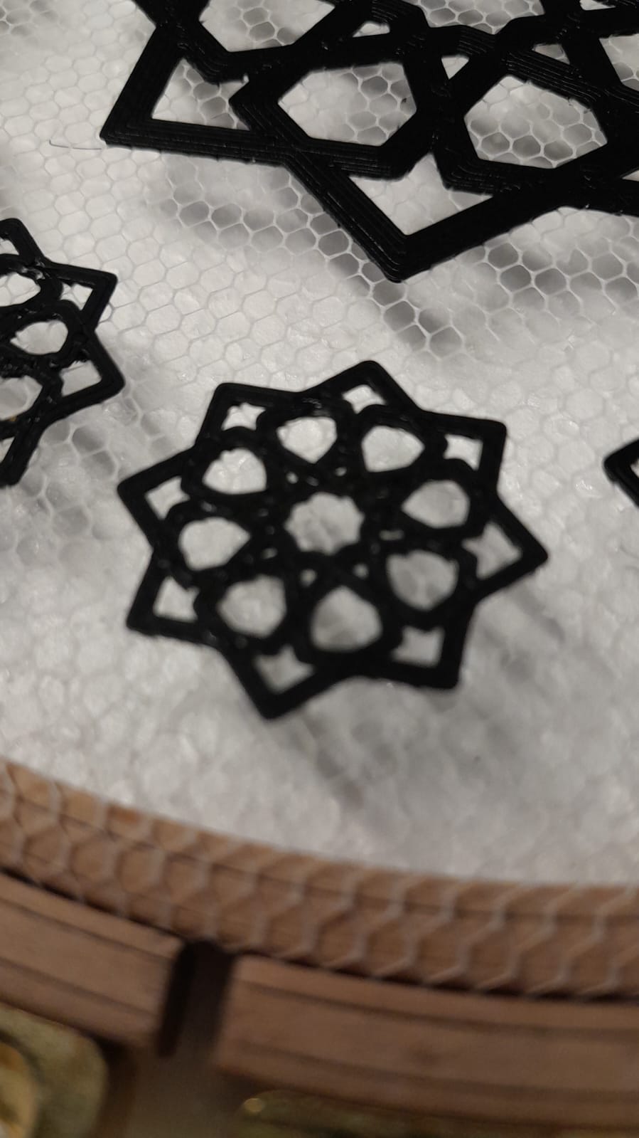 Smaller motif variations embedded into textile