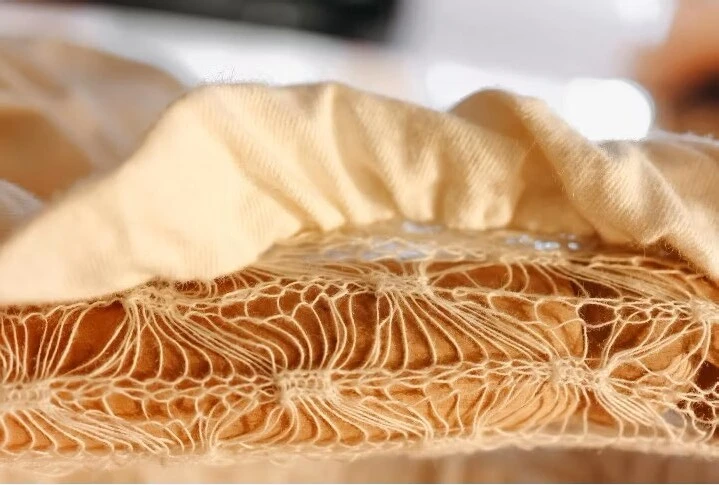 A biomaterial fiber hand woven