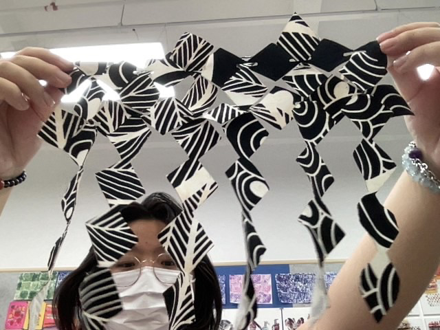 The assembled sheet held up against the light