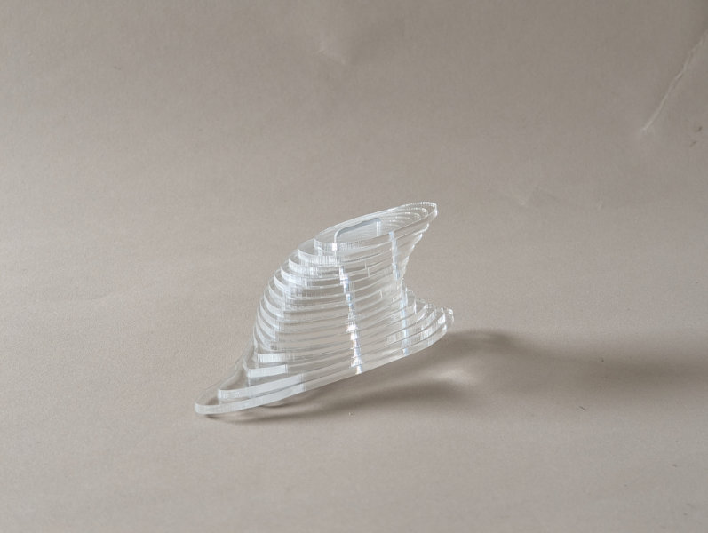 clear plastic form made of stacked layers